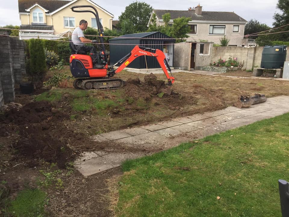 Mini Digger Levelling Garden. Eoin O'Keeffe Architects