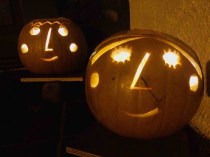 2 Puca Pumkins. Faces cut into pumpkins. Ben and Holly. Eoin O'Keeffe Architects