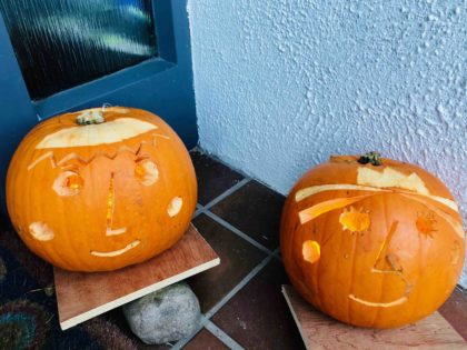 2 Puca Pumkins. Faces cut into pumpkins. Ben and Holly. Eoin O'Keeffe Architects